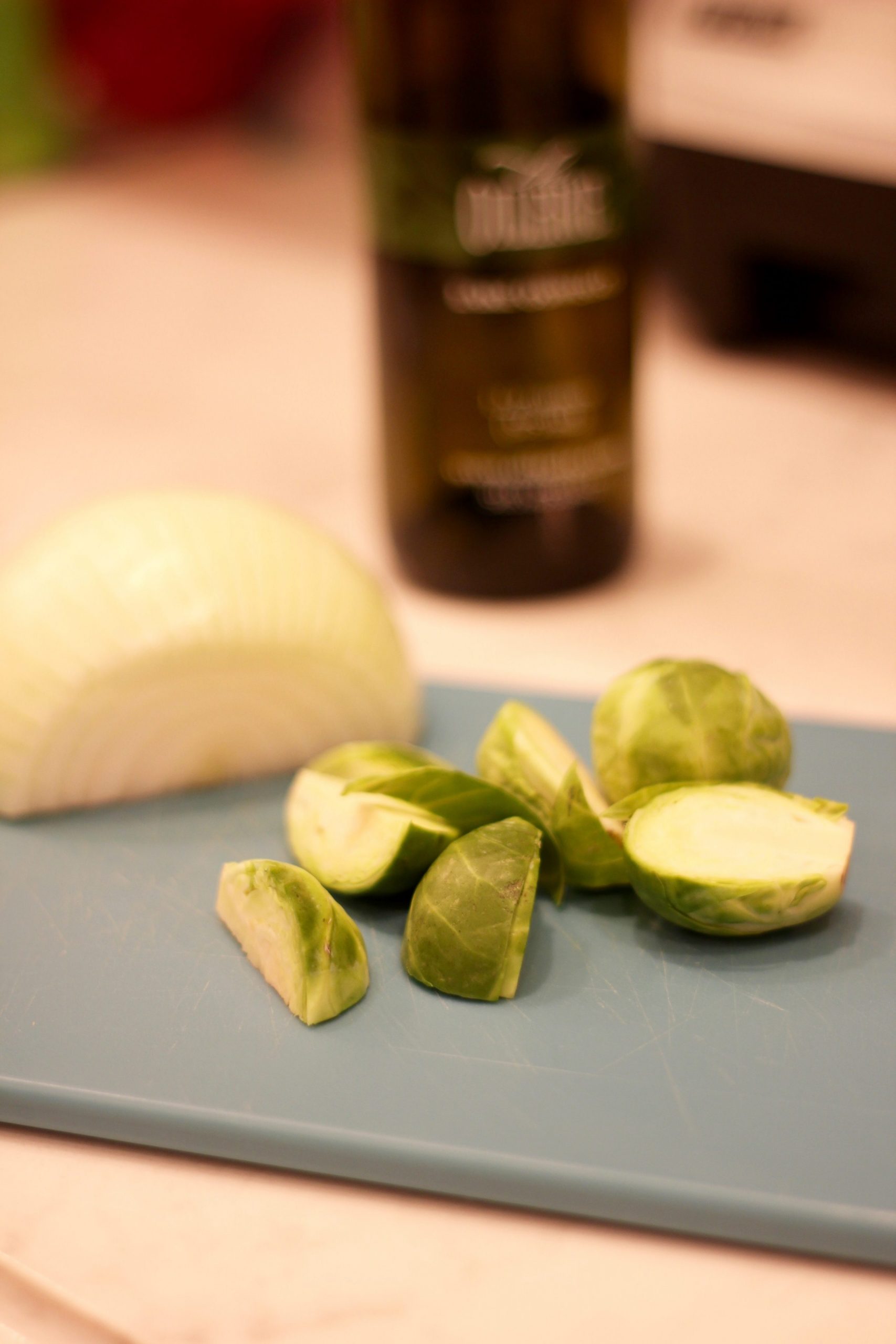 cut brussel sprouts on cutting board
