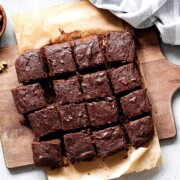Dark chocolate brownies on a cutting board