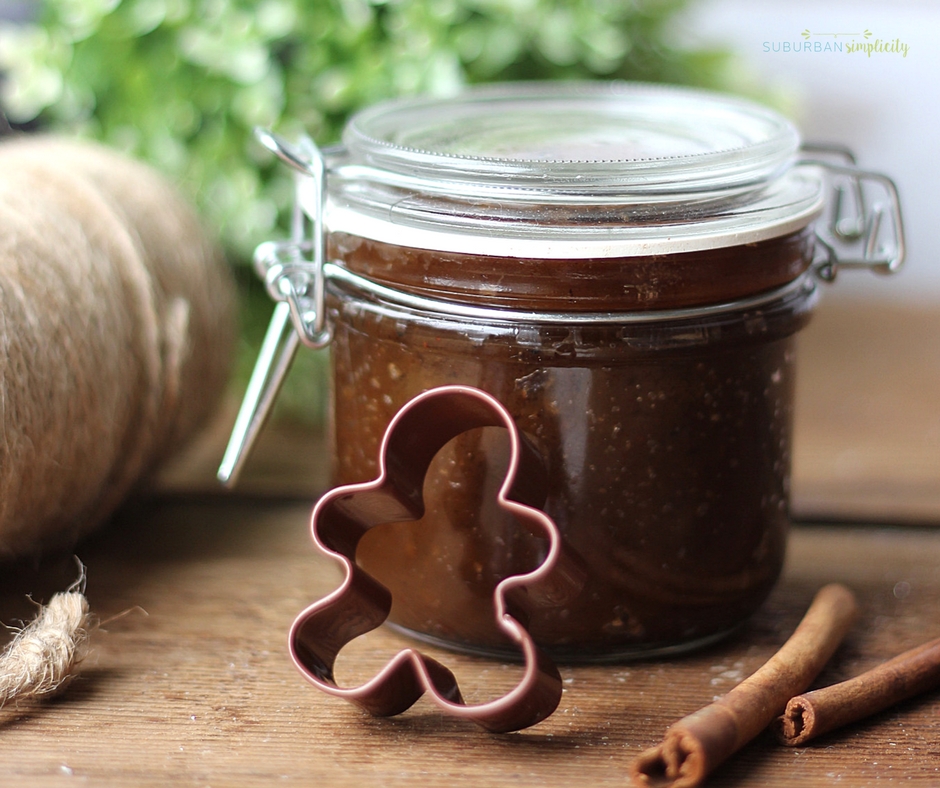 Gingerbread scrub with a gingerbread man cutter cutter next to it.