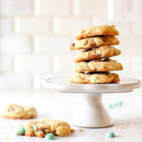 Mint Chocolate Chip Cookies on a cake stand.