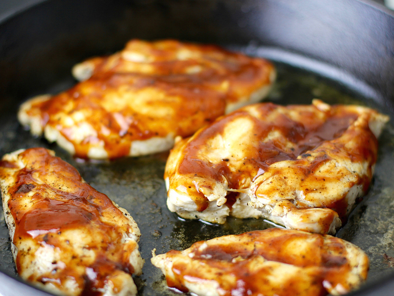 BBQ sauce smothered over chicken to make Monterey Chicken.