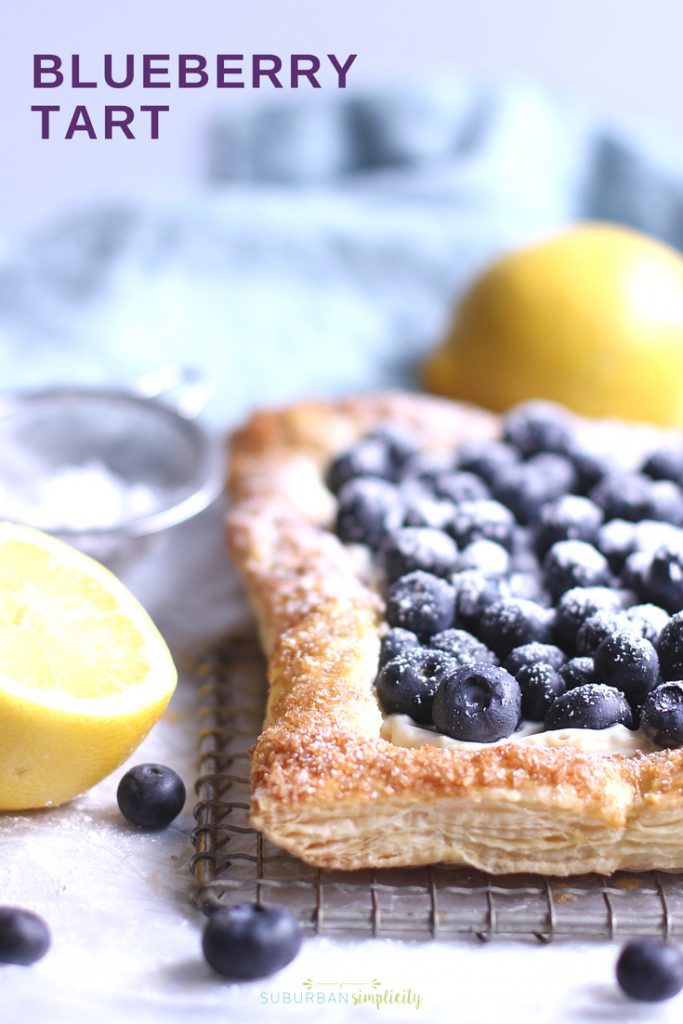 This Blueberry Cream Cheese Tart with Puff Pastry is so easy to make and so pretty to serve. Golden, flakey crust filled with creamy cheesecake filling, topped with fresh blueberries.