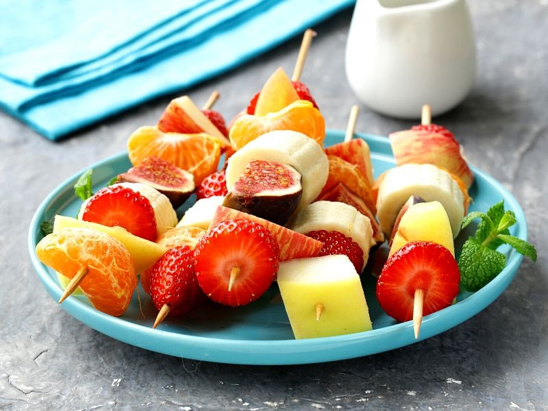 Fruit skewers on a plate