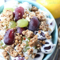 Grape salad in a bowl topped with granola