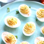 Blue plate full of deviled eggs.