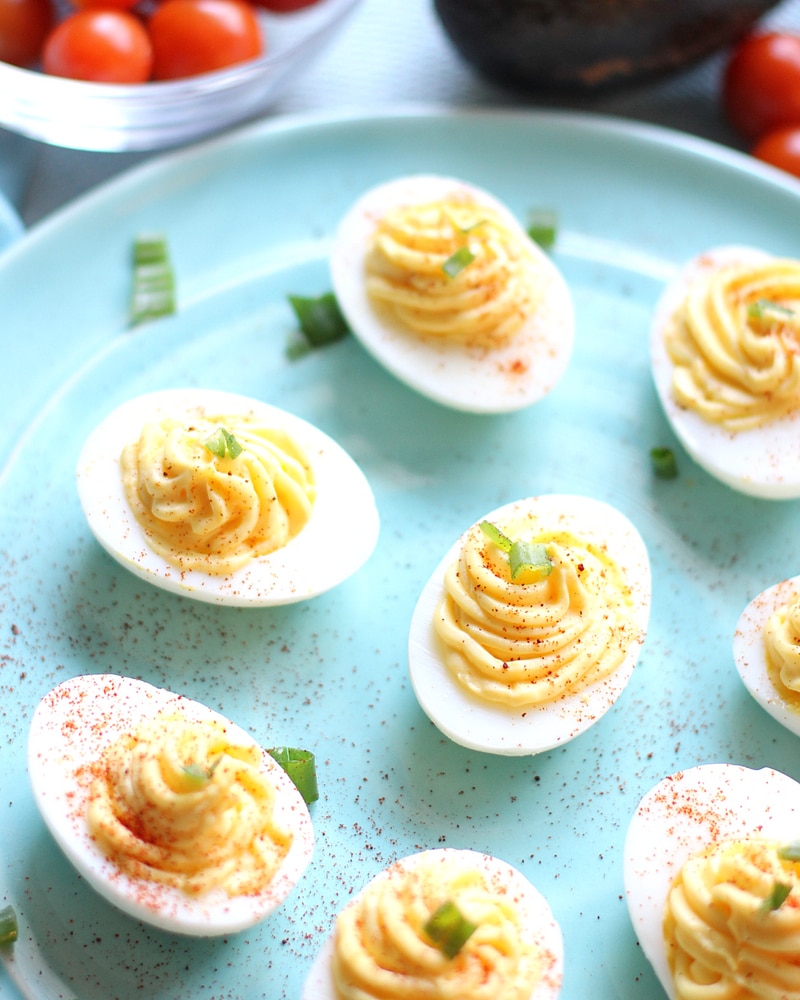 Blue plate full of deviled eggs.