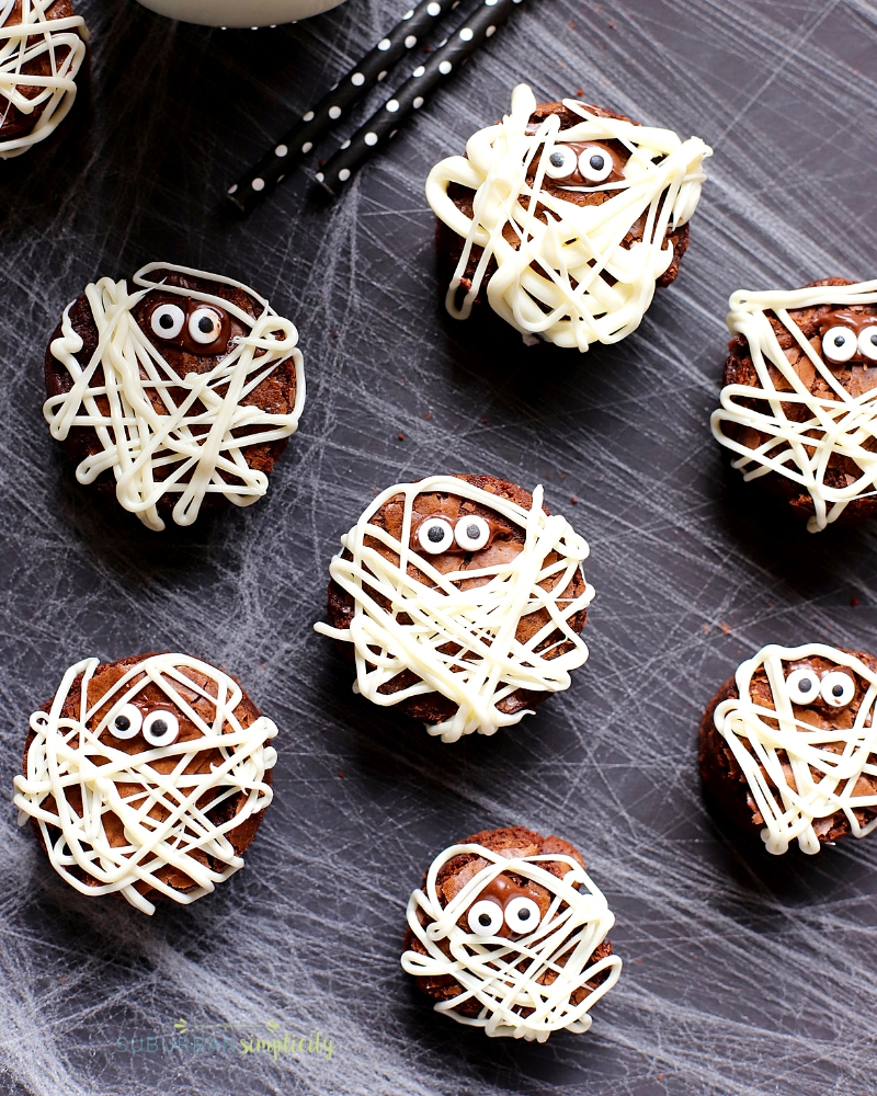 Brownie Mummies on spider web background.