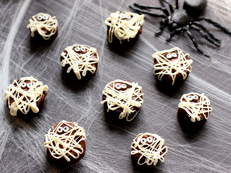 These Mummy Brownies are perfect for Halloween!  They'll scare up a good time and they're so easy to make! The perfect kid-friendly treat!