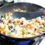 Ingredients being cooked for crock pot taco soup.