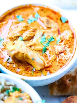 Bowl filled with Instant Pot Cooked butter chicken.