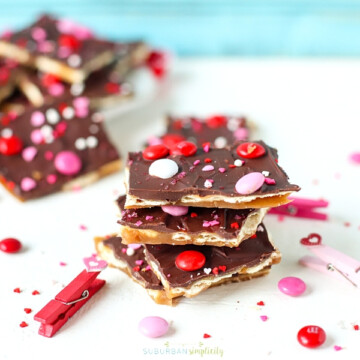 Valentine's Day Saltine Toffee Stacked together on a table.