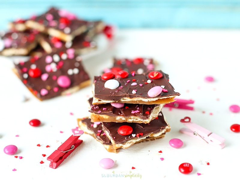 Valentine's Day Saltine Toffee Stacked together on a table.
