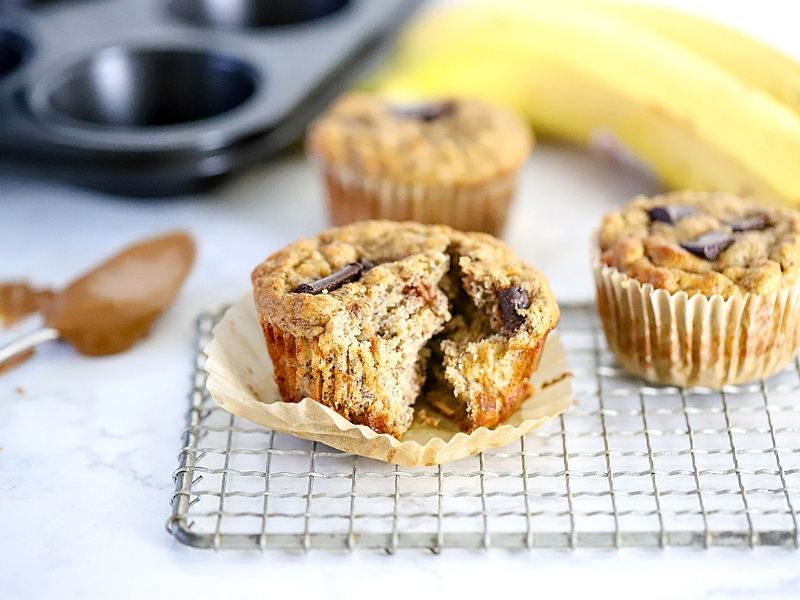 Banana Almond Butter Muffins on the counter.