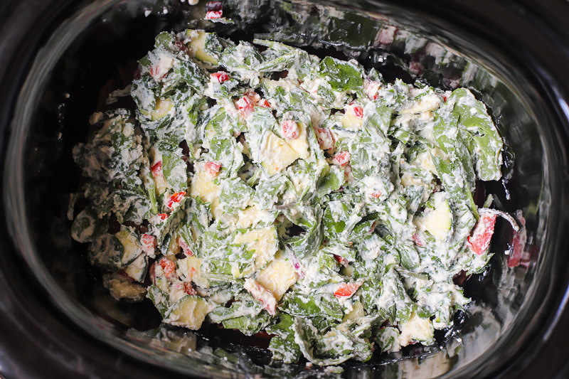 layering of ingredients in the crockpot for lasagna