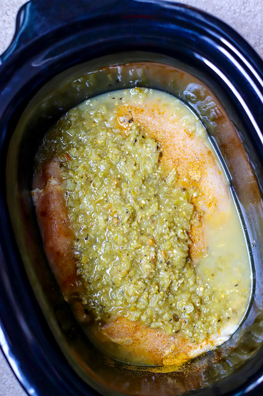 Crock pot with salsa verde inside