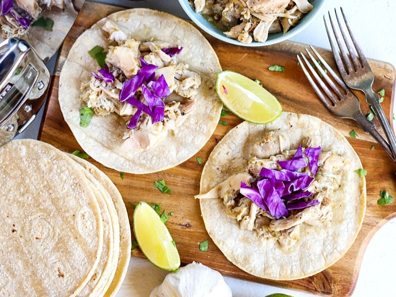 salsa verde chicken on corn tortillas
