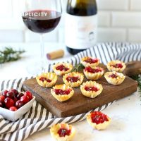 Cranberry Brie Bites are a deliciously easy way to entertain guests! With only 3-ingredients you have a wonderful bite-sized appetizer to serve at your next party!