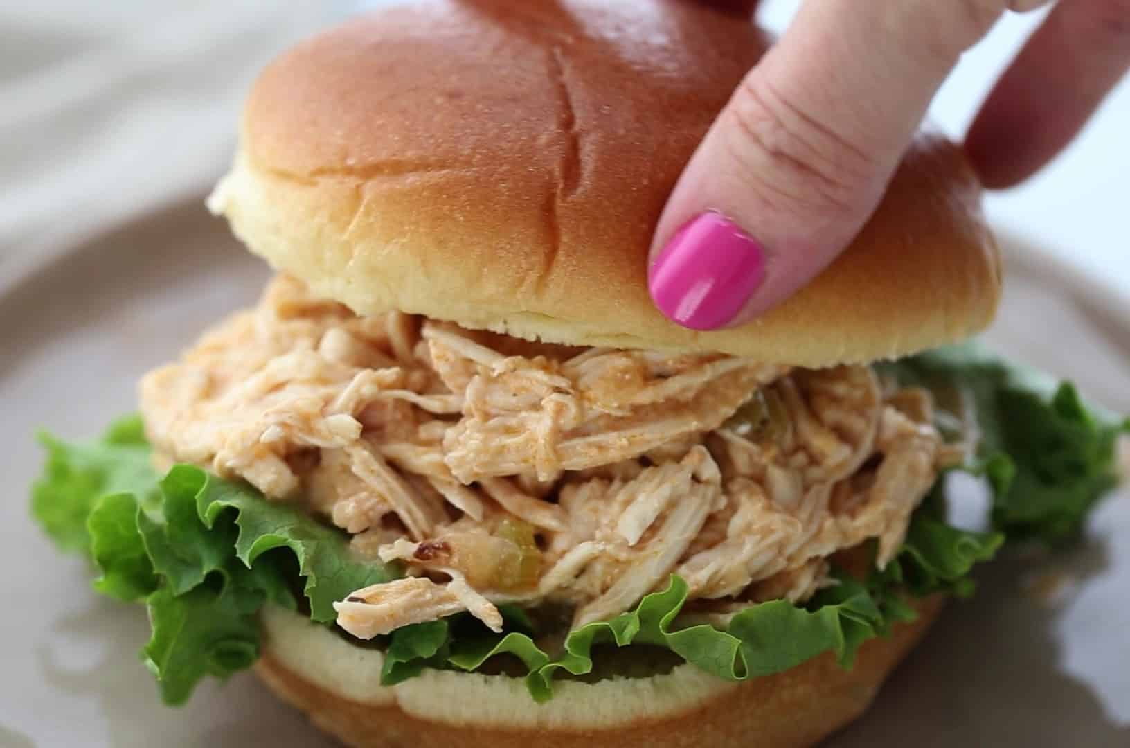 Crockpot Buffalo Chicken is the perfect easy weeknight meal, appetizer, or meal prep recipe that is versatile, full of flavor, and healthier!