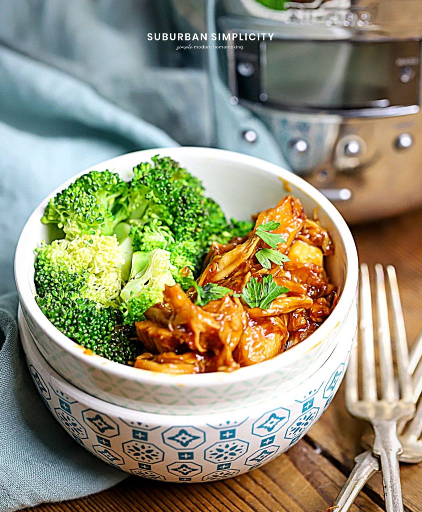 Slow Cooker Honey Garlic Chicken in a bowl with Broccoli