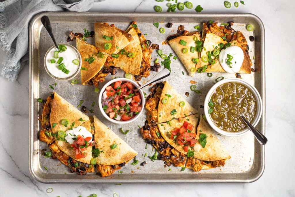 https://www.suburbansimplicity.com/wp-content/uploads/2020/05/FINAL-sheet-pan-quesadillas-1-8-1024x683.jpg