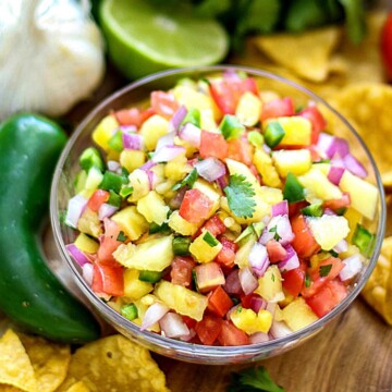 Fresh Pineapple Salsa is an incredibly easy recipe that wows both in flavor, and it's colorful presentation. With a few simple ingredients, you have a healthy snack, appetizer, or recipe topper that's not only flavorful; it's light and 100% delicious!