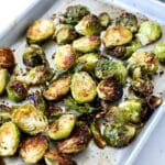 Baking sheet with Brussels sprouts that roasted.
