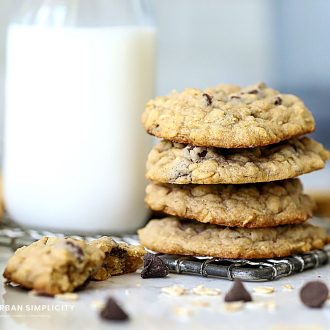The Best Oatmeal Chocolate Chip Cookies next to a glass of milk