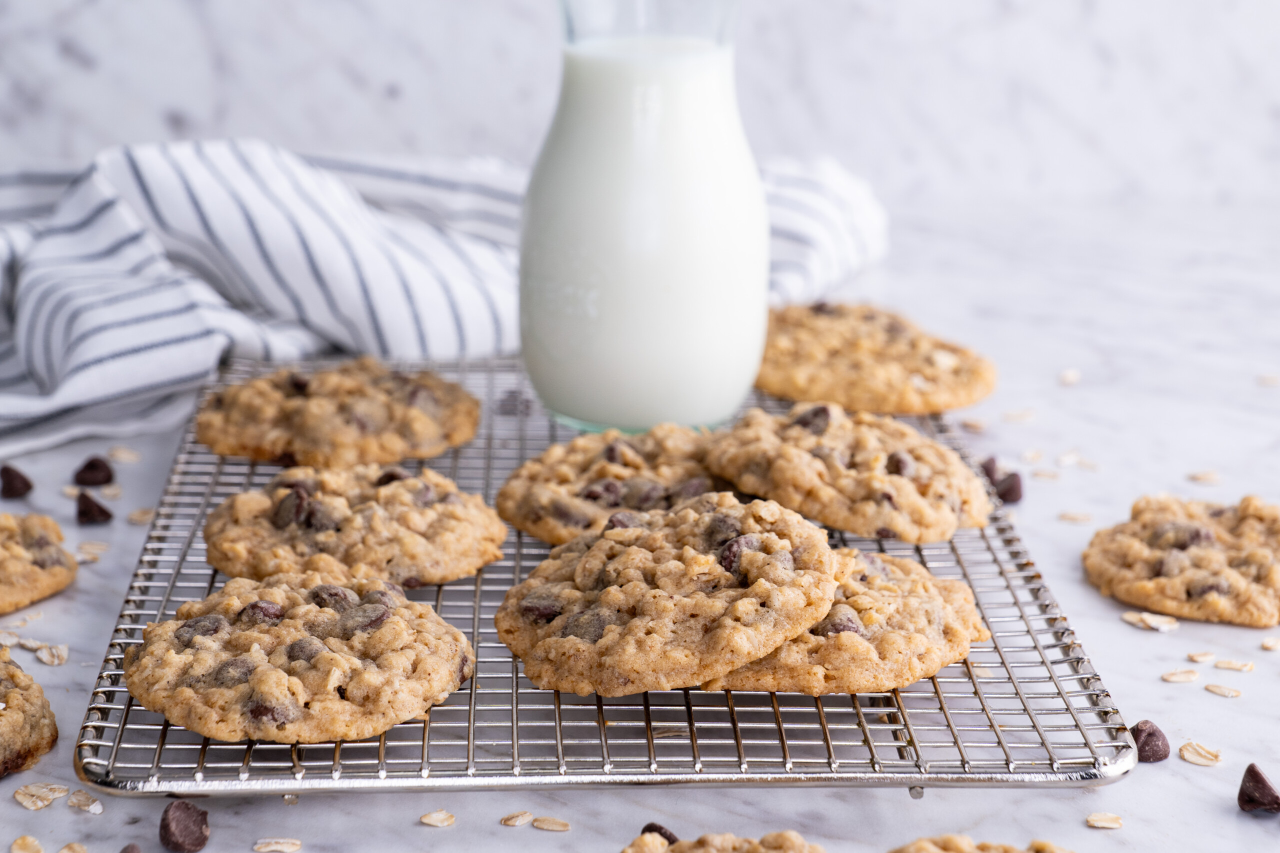 Oatmeal Chocolate Chip Cookies next to a glass of milk