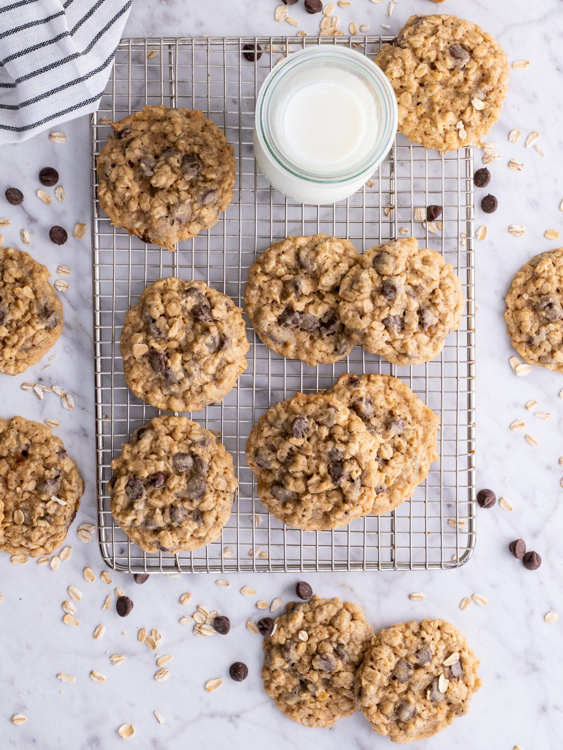 Nestle Oatmeal Chocolate Chip Cookies next to a glass of milk.