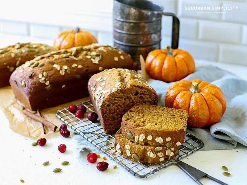 A large batch of pumpkin bread on a counter