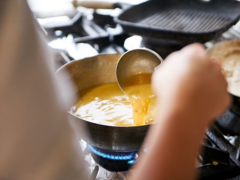 gravy cooking on a stove