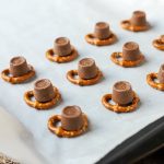 Rolo Pretzels on a baking tray.