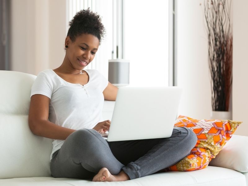 woman paying bills on a computer