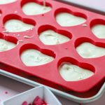 white chocolate candy in a silicone mold.