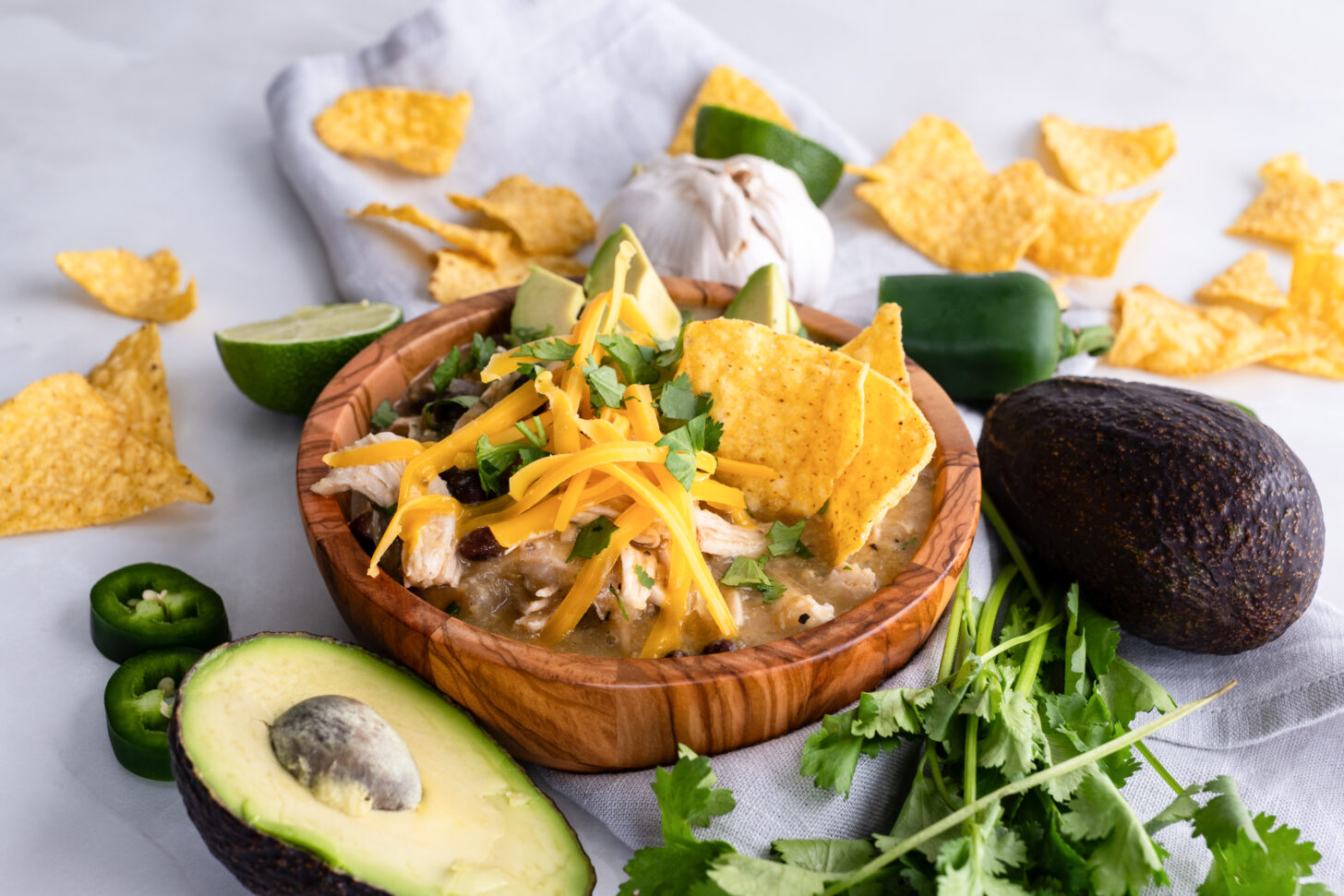 side view of green chili chicken enchilada soup