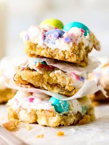 Three confetti sugar cookies bars stacked on each other.