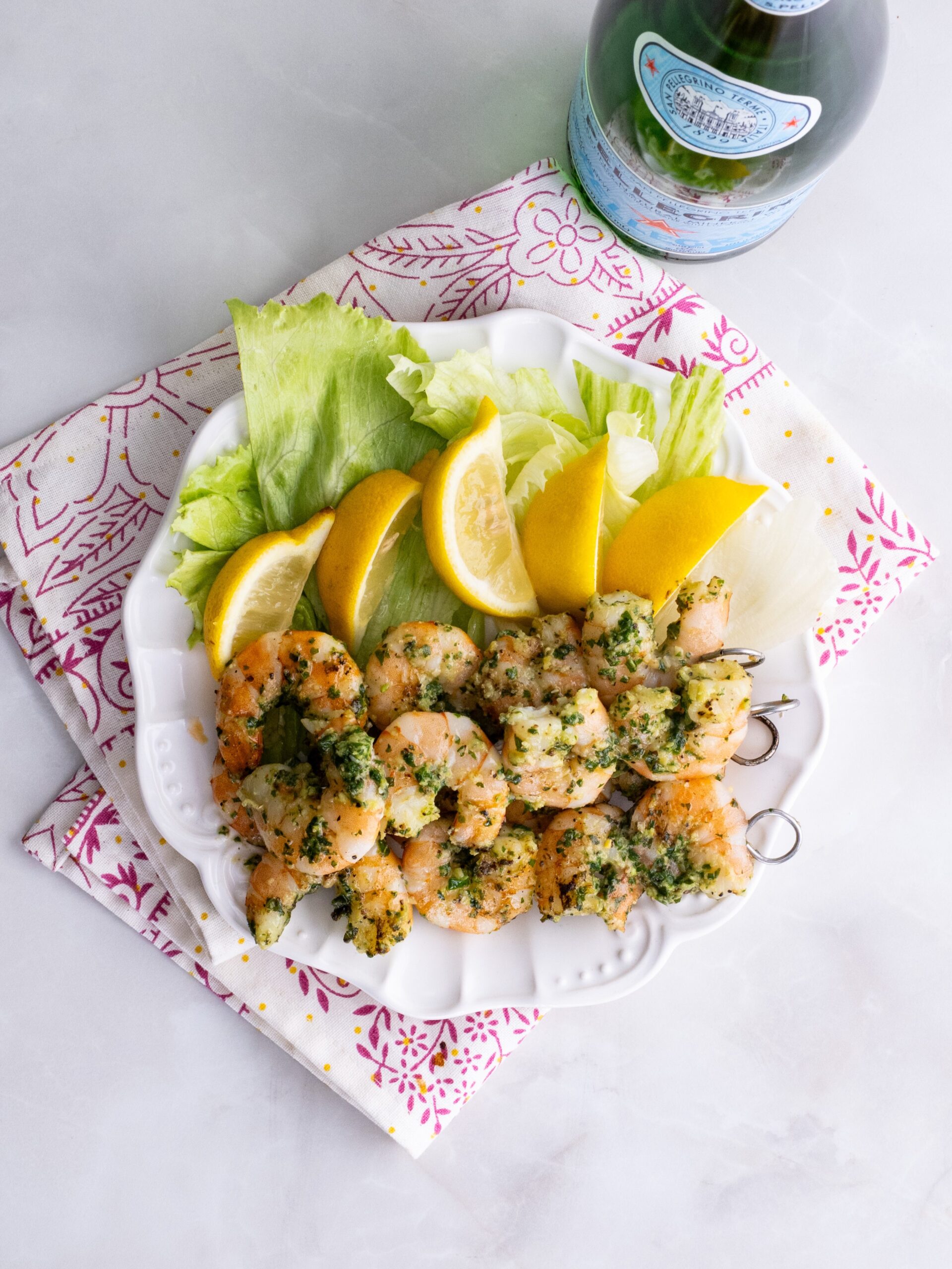 shrimp skewers on a plate