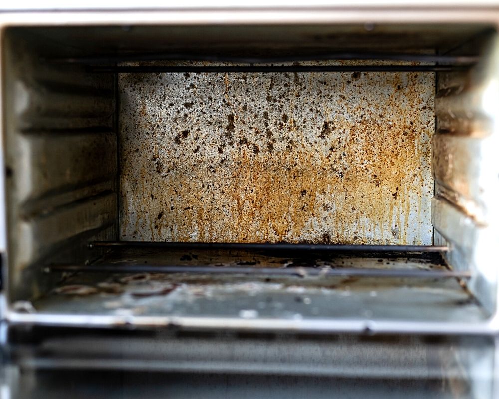 inside of a dirty oven