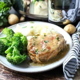 Ranch pork chop on a plate with broccoli