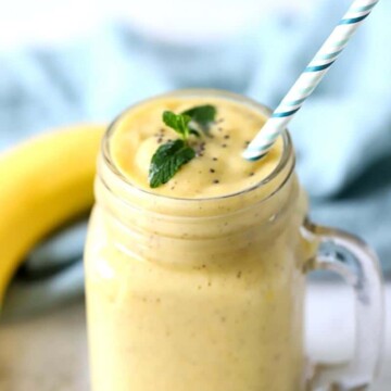 smoothie in a cup with a straw