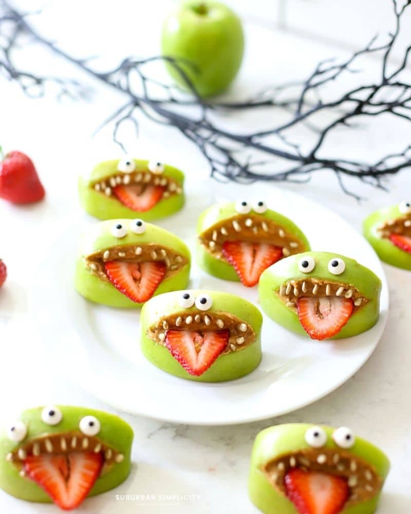 Monster apple mouths on a white plate