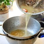 straining turkey stock
