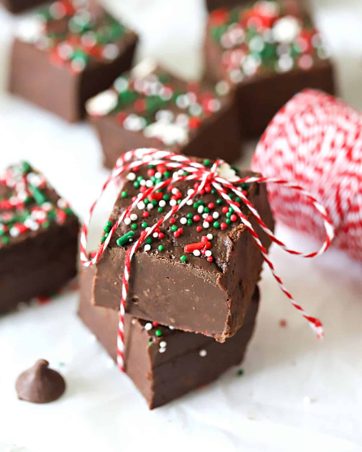 Two pieces of fudge stacked on top of each other.