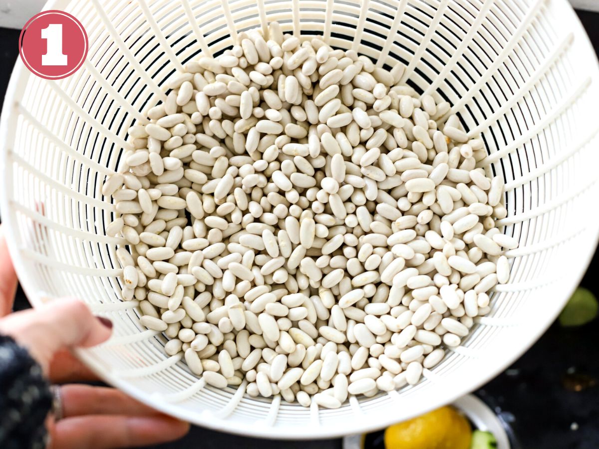 Great northern beans in a colander.
