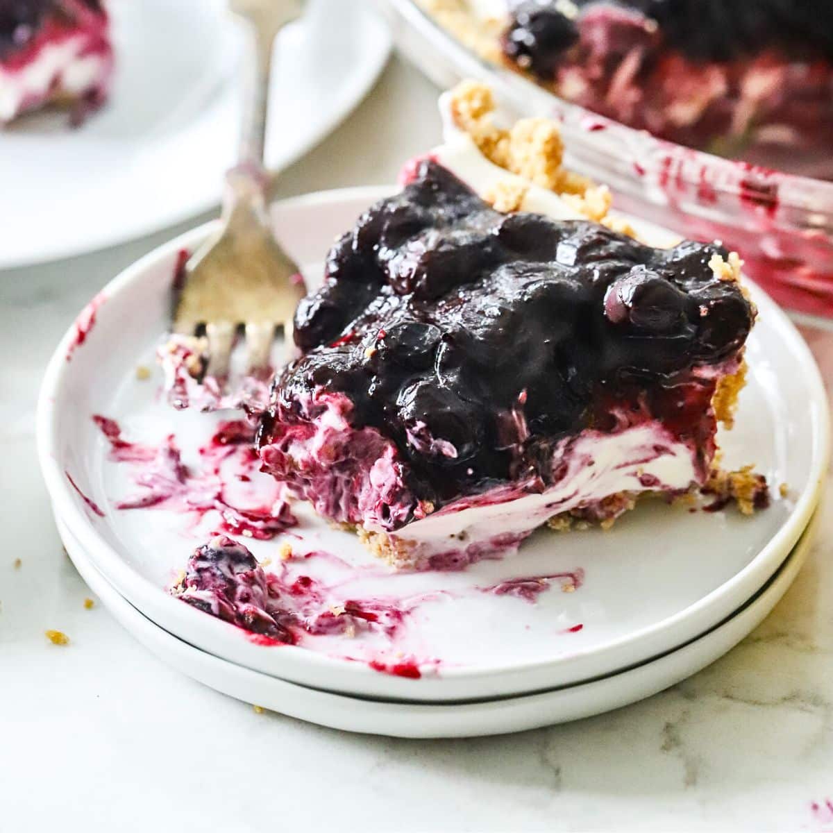 https://www.suburbansimplicity.com/wp-content/uploads/2023/05/No-Bake-blueberry-cream-cheese-pie.jpg