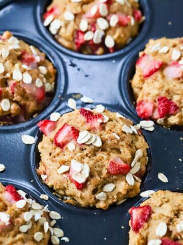 Strawberry Muffins in a muffin pan.