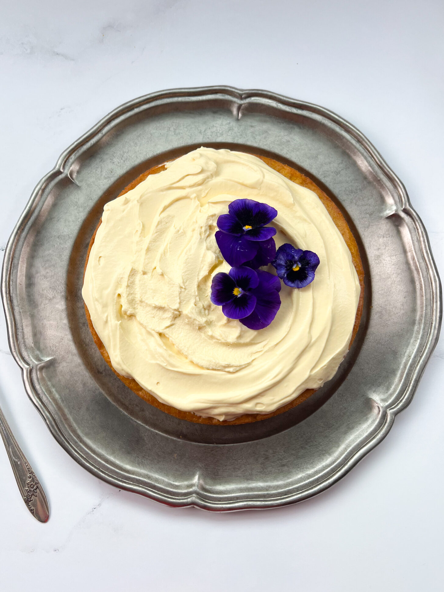 Full mango cake with mango mascarpone whipped cream frosting