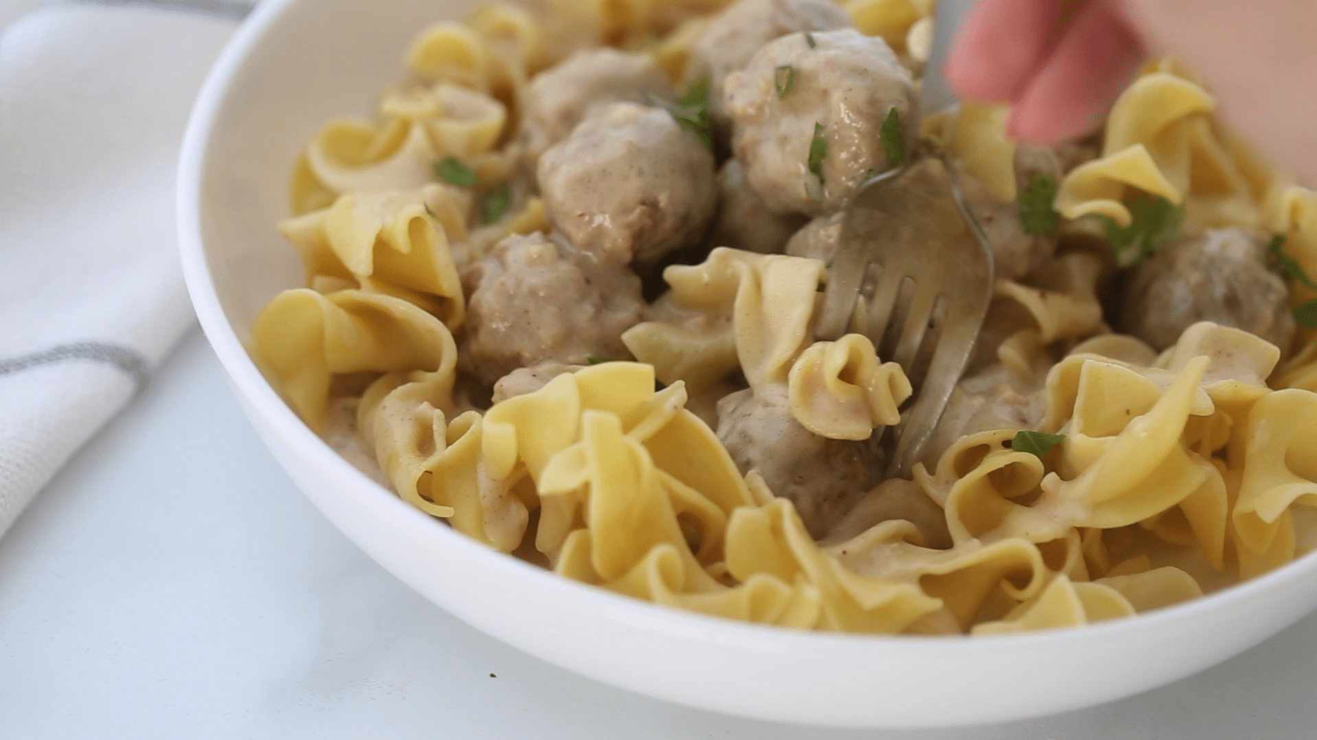 Slow Cooker Swedish Meatballs with egg noodles